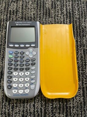 Texas Instruments TI-84 Plus Silver Edition with Bright Yellow Slide Cover